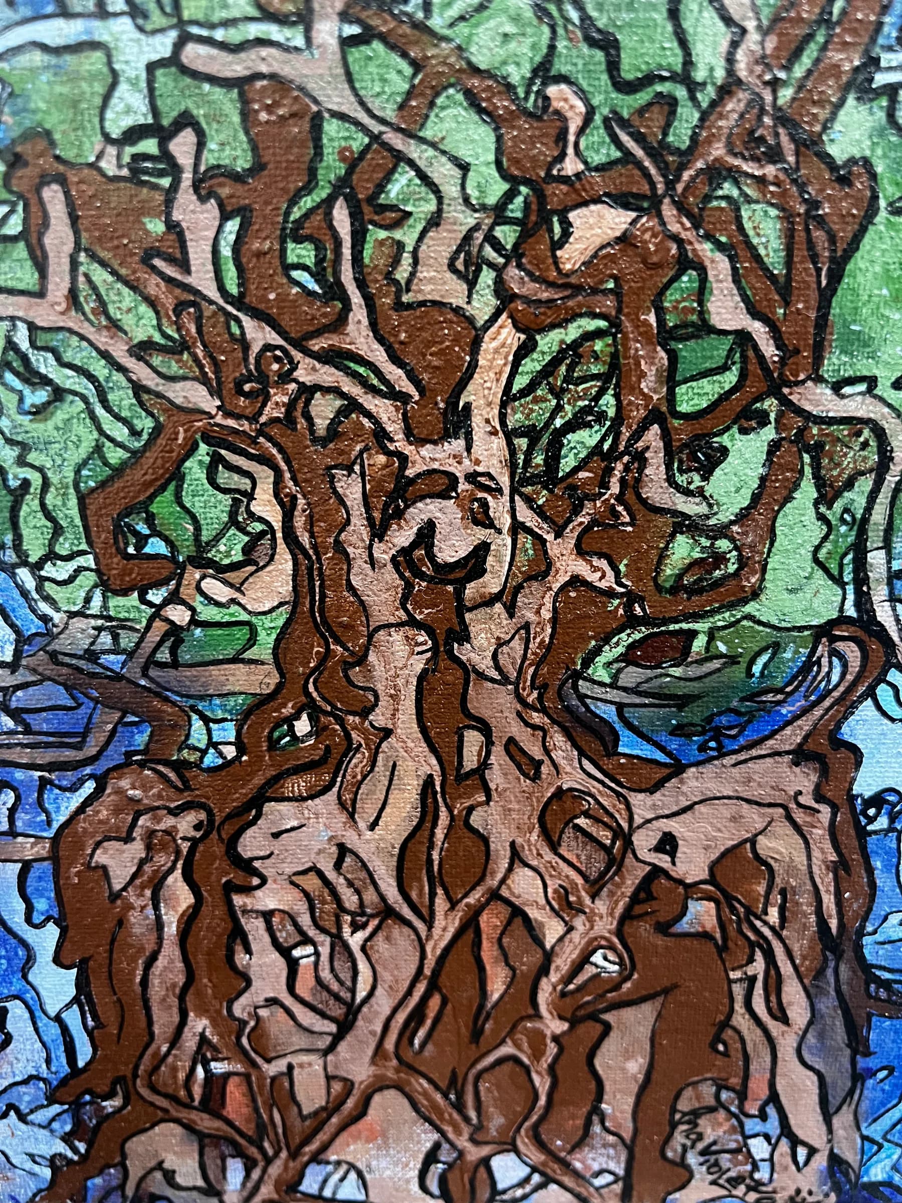 It Kinda Began Here by Ana Violeta Horta, a brown tree with multiple faces in its branches over green and blue pigment